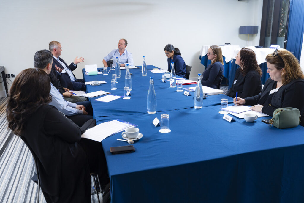 Delegates taking part in thehrdirector debate partnered by Wilson